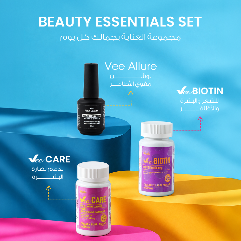 Beauty supplement kit featuring two white biotin and care capsule bottles and a black nail lotion bottle; Biotin Beauty Kit with bright pink labels.