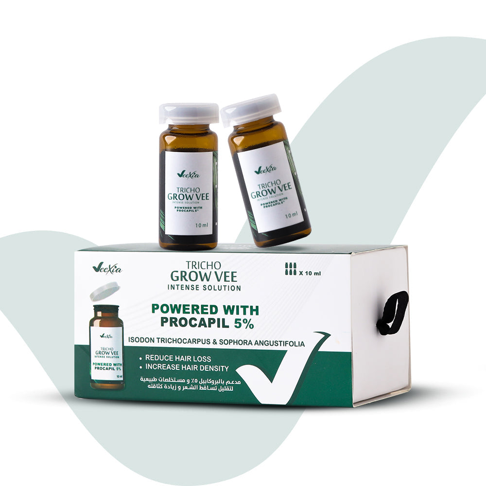 Tricho Grow Vee Intense Hair Solution packaging with ampoules, featuring Procapil, Kamigen E & K, and Biotin for hair regrowth and scalp nourishment.